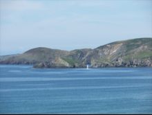 Calm water off Newgale by Jayne