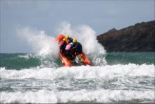 Surfing the waves at Whitesands by Marian